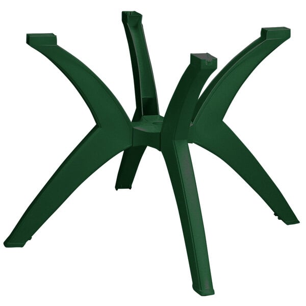 A green plastic Grosfillex outdoor table stand with four legs.