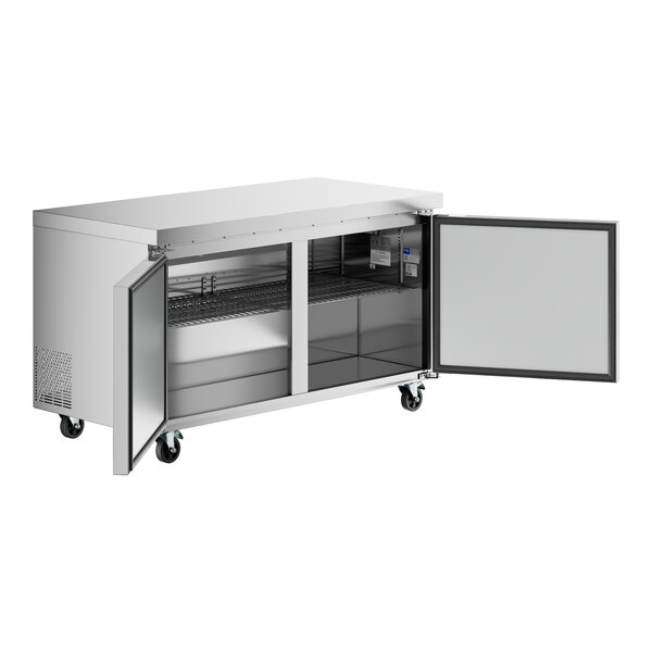 An Avantco AU-60F 60-inch undercounter freezer with two open doors and interior shelving.