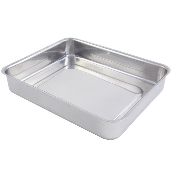 A silver rectangular stainless steel roasting pan.
