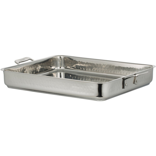 A silver rectangular stainless steel roasting pan with a handle.