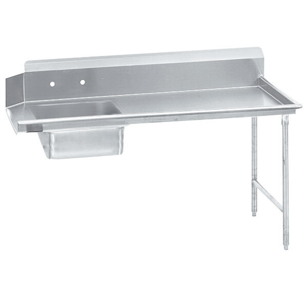 A stainless steel Advance Tabco dishtable on a counter.