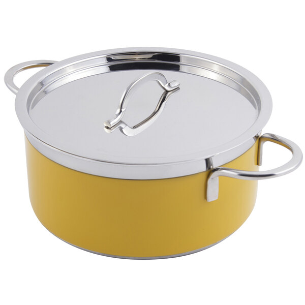 A yellow Bon Chef sauce pot with a stainless steel lid.