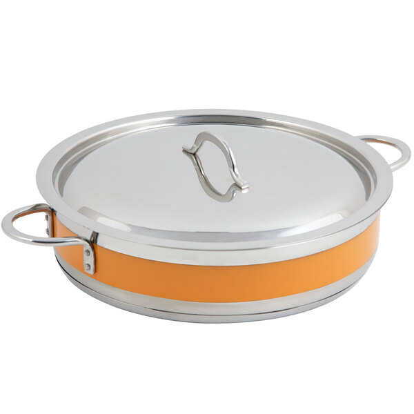 A Bon Chef stainless steel brazier pot with an orange cover and handle.