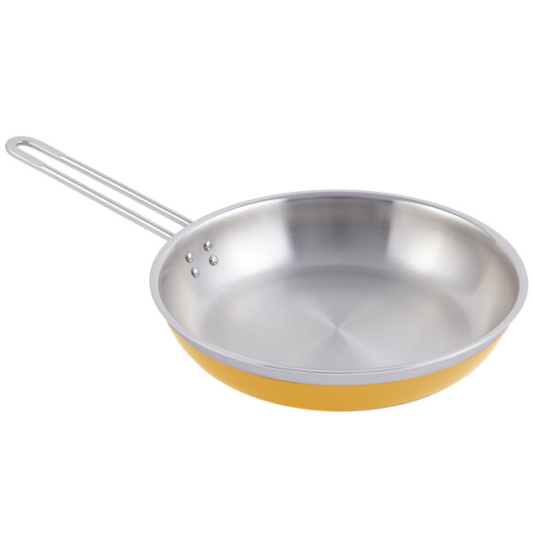 A yellow Bon Chef saute pan with a long handle.