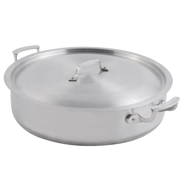 A Bon Chef stainless steel brazier pot with a lid.