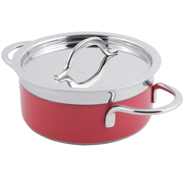 A red Bon Chef sauce pot with a stainless steel lid.