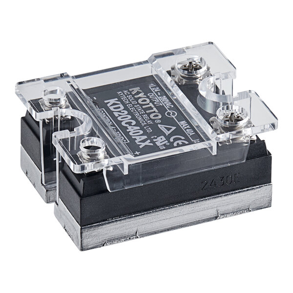 A white plastic Estella Caffe solid state relay.