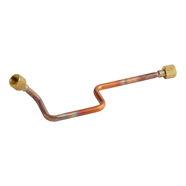 A close-up of a copper pipe with brass fittings.