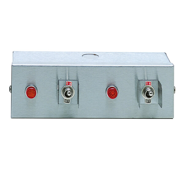 A silver metal box with three red toggle switches.