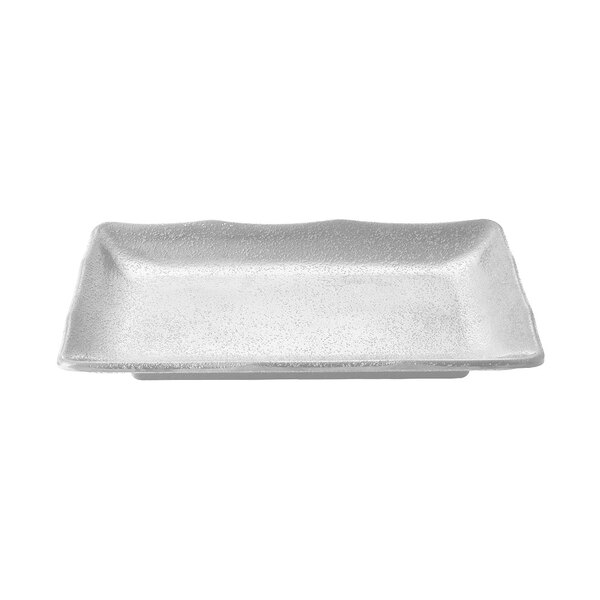 A white rectangular melamine tray with a textured surface.