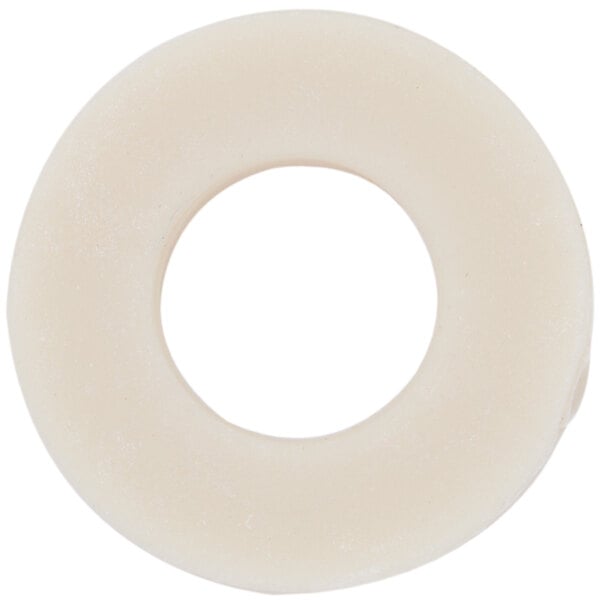 A white rubber washer seat with a hole in the middle.