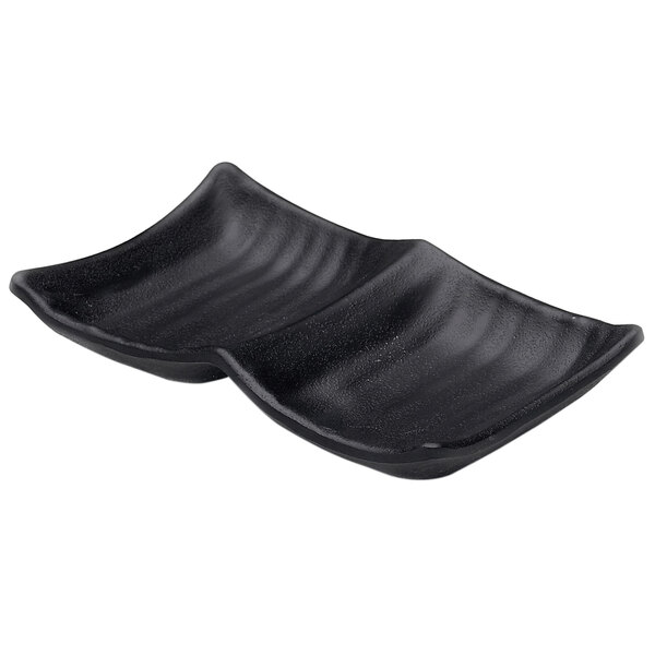 A black rectangular melamine tray with two compartments and a wavy design.