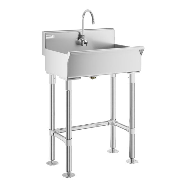 A stainless steel hand sink with a tall backsplash, gooseneck faucet, and four sturdy legs.