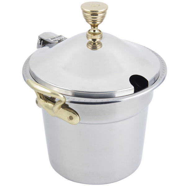A silver stainless steel Bon Chef soup tureen with a hinged lid and round brass handles.