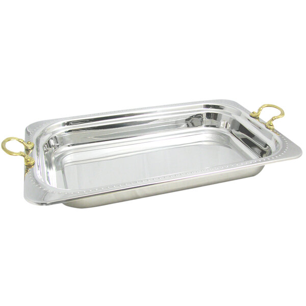 A stainless steel rectangular food pan with round brass handles.