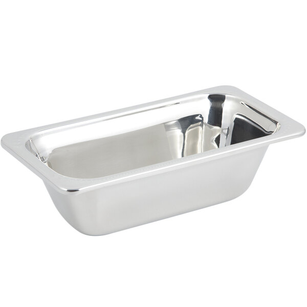 A stainless steel Bon Chef rectangular food pan with a laurel design on the lid.