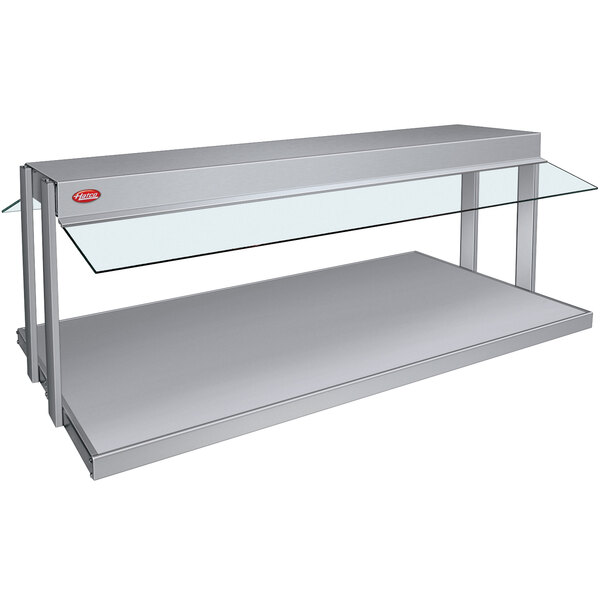 A silver countertop Hatco buffet warmer with glass shelves.