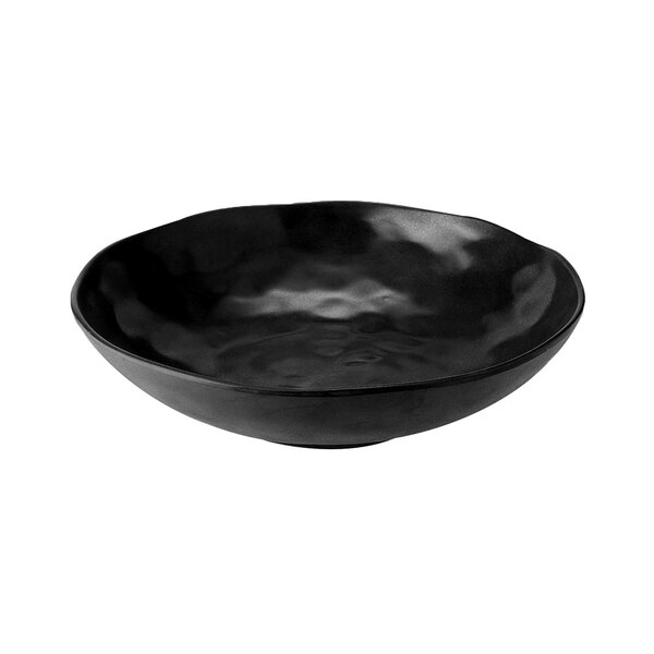 A black Elite Global Solutions Zen melamine bowl with wavy edges.