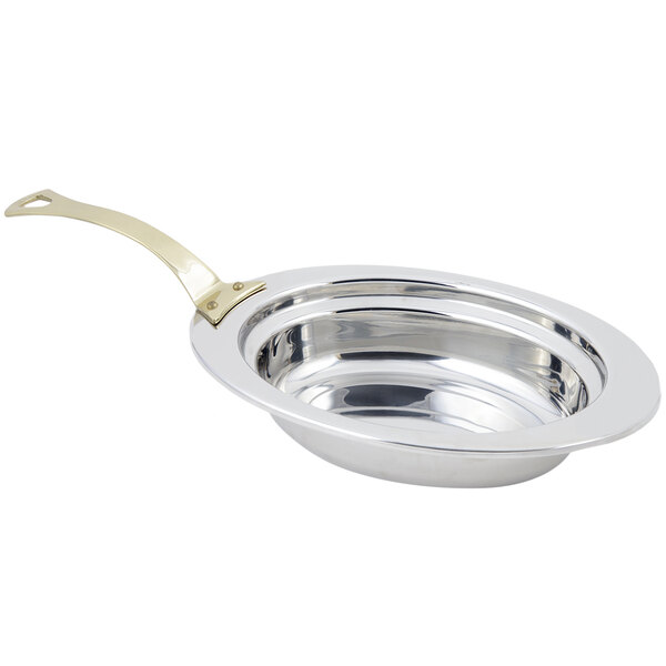 A Bon Chef stainless steel full size oval food pan with a long brass handle.