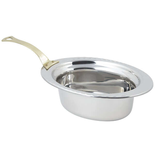 A silver stainless steel Bon Chef food pan with a long brass handle.