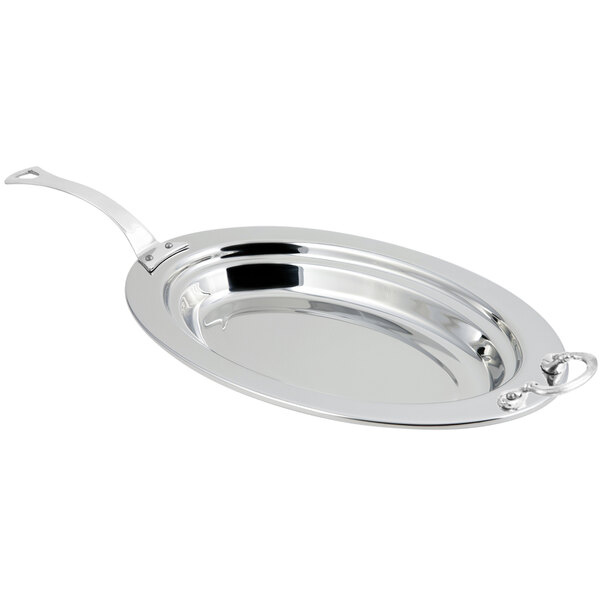 A silver stainless steel Bon Chef oval food pan with a long handle.