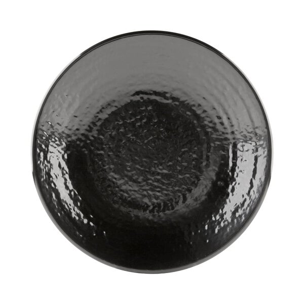 A close-up of a black Elite Global Solutions Pebble Creek plate with a textured surface.