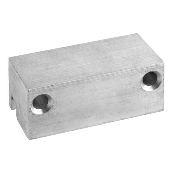 A rectangular stainless steel block with two holes.