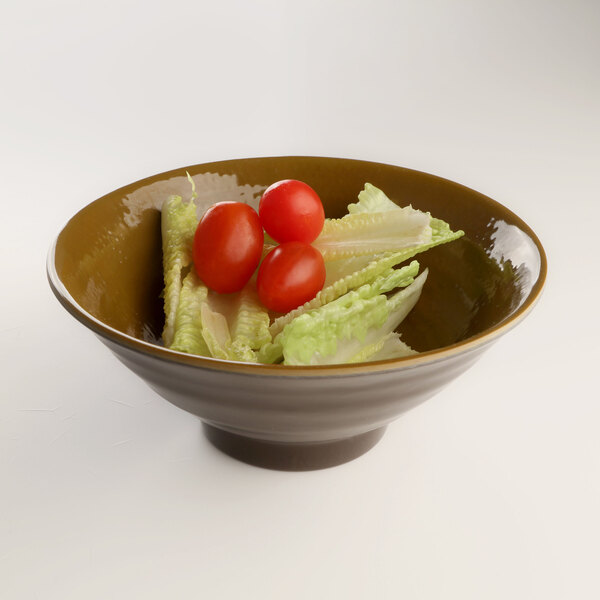 A Pebble Creek Tapenade-colored melamine bowl with lettuce and tomatoes in it.