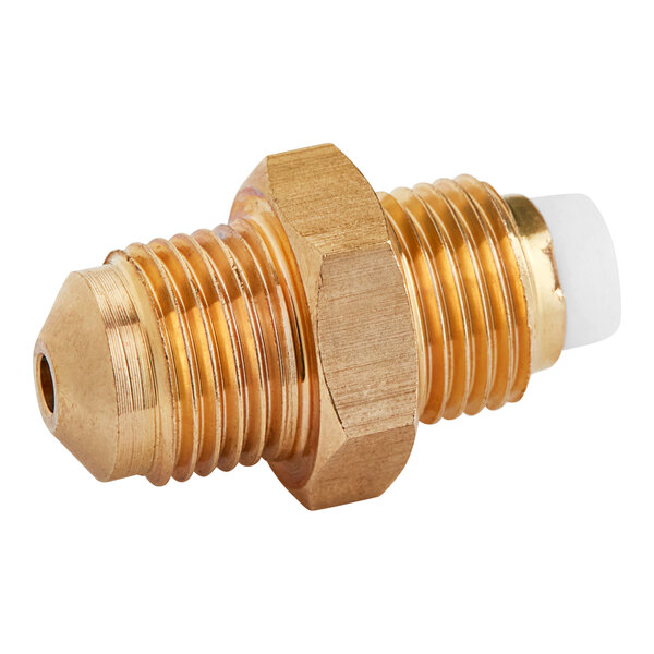 A close-up of a brass threaded male fitting.