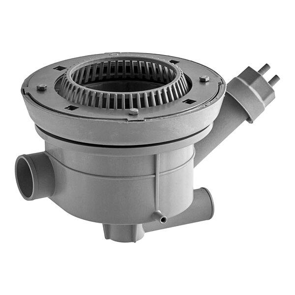 A grey plastic drain manifold assembly with a circular hole.
