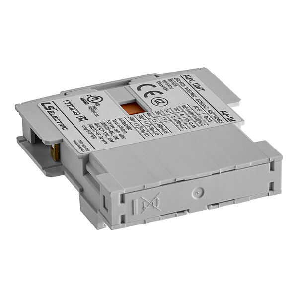 A white and grey Noble Warewashing contactor switch with a label on the circuit board.