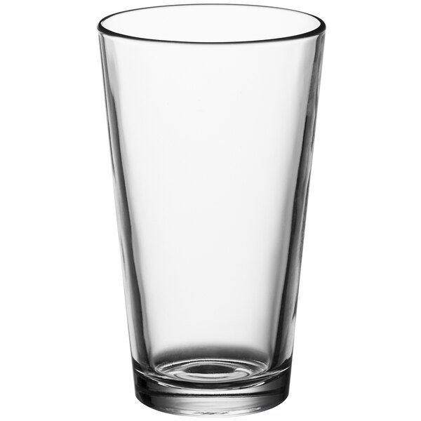 An Acopa clear mixing glass with a white background.