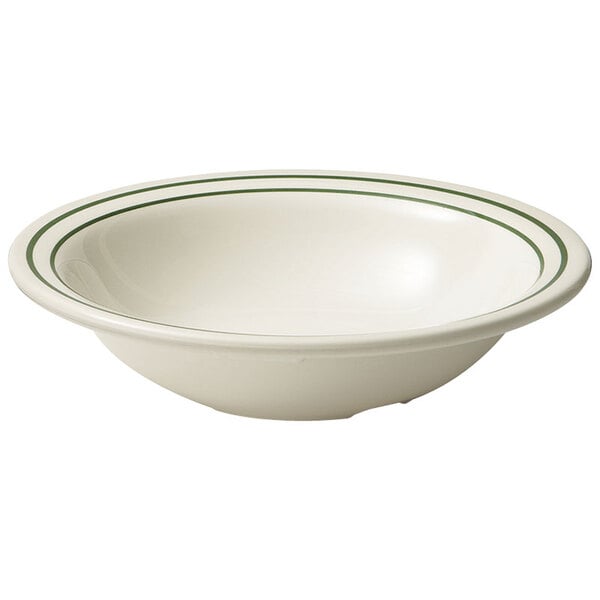 A white bowl with green stripes.