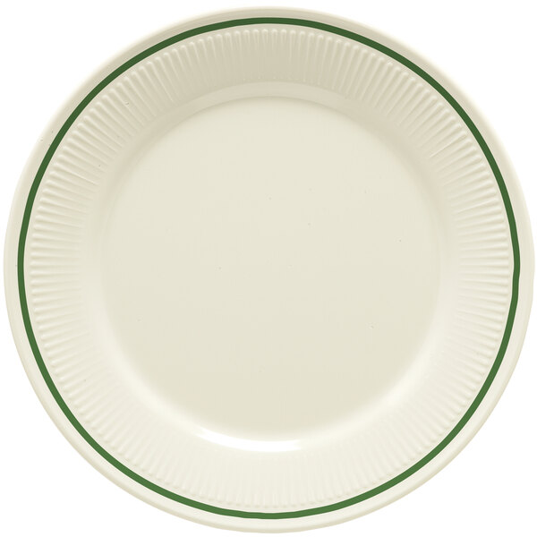 A white plate with green trim.