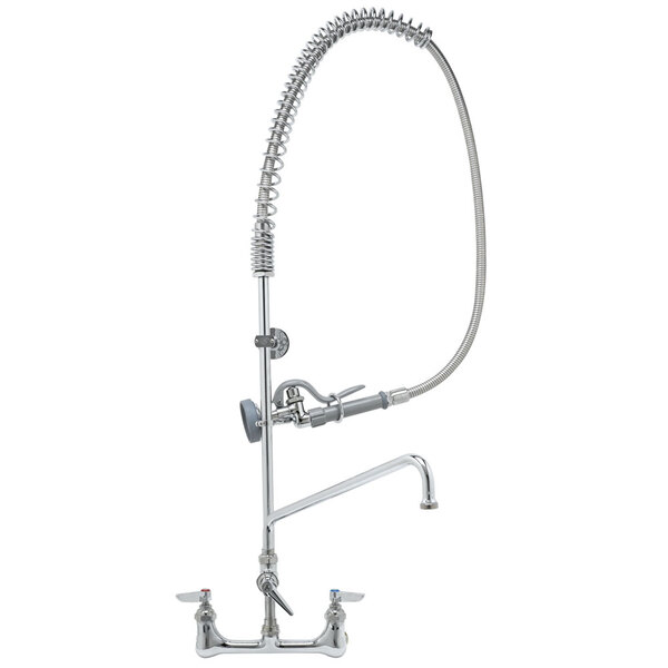 A T&S chrome wall mounted pre-rinse faucet with a curved hose attached.