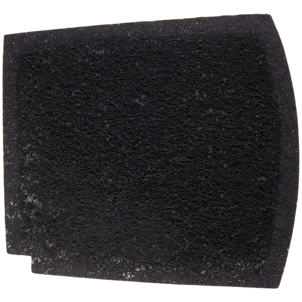 A black sponge with white spots on a white background.