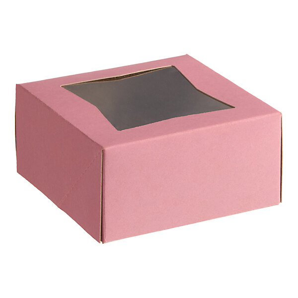 A pink rectangular Baker's Lane bakery box with a black window.