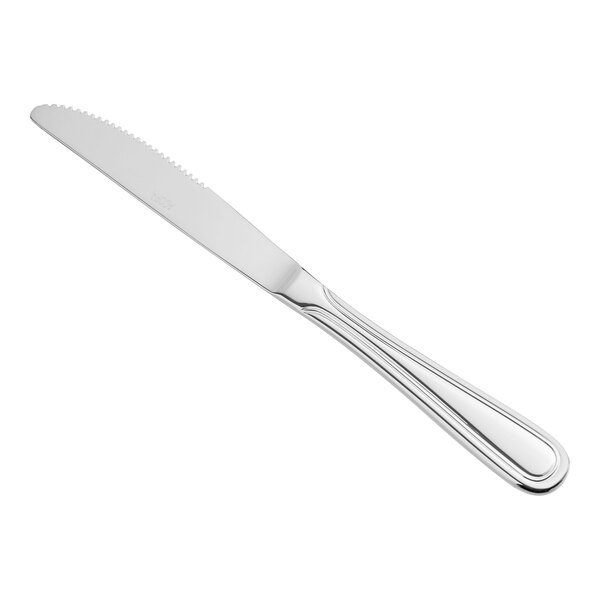 An Acopa Edgeworth stainless steel dinner knife with a silver handle.