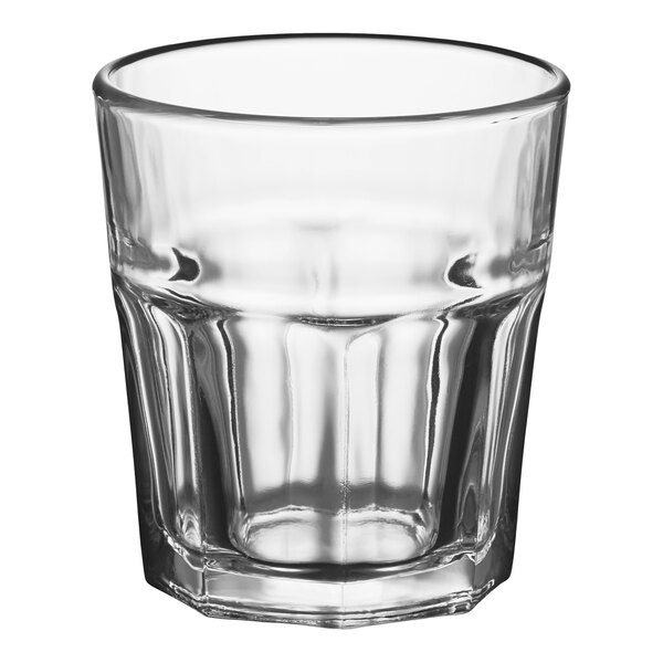 A clear, faceted 11.5 oz. rim tempered rocks glass.