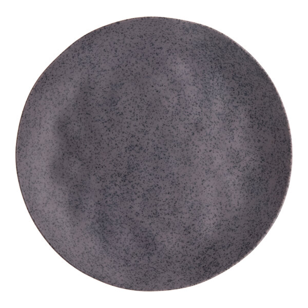 A dark gray round melamine plate with a speckled pattern.