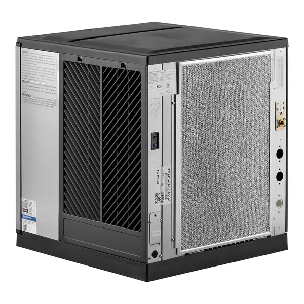 An air-cooled modular half cube ice machine with a metal exterior and vented panels.