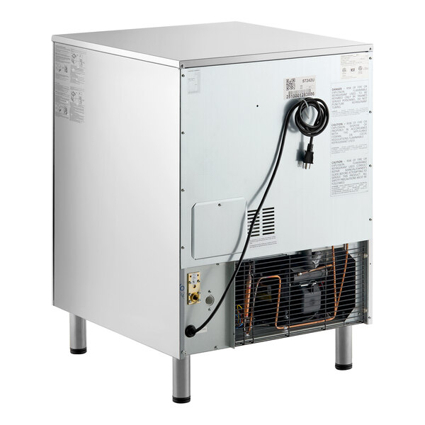 An air-cooled undercounter ice machine with a stainless steel exterior, visible power cord, and rear ventilation components.
