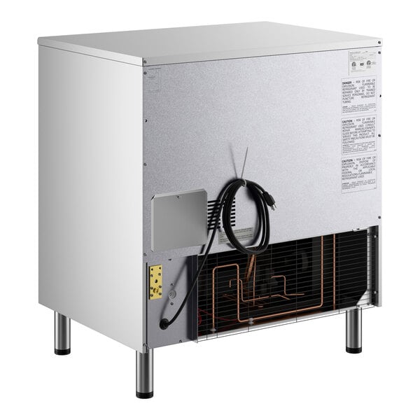 An air-cooled undercounter full cube ice machine with a stainless steel exterior and visible power cord.