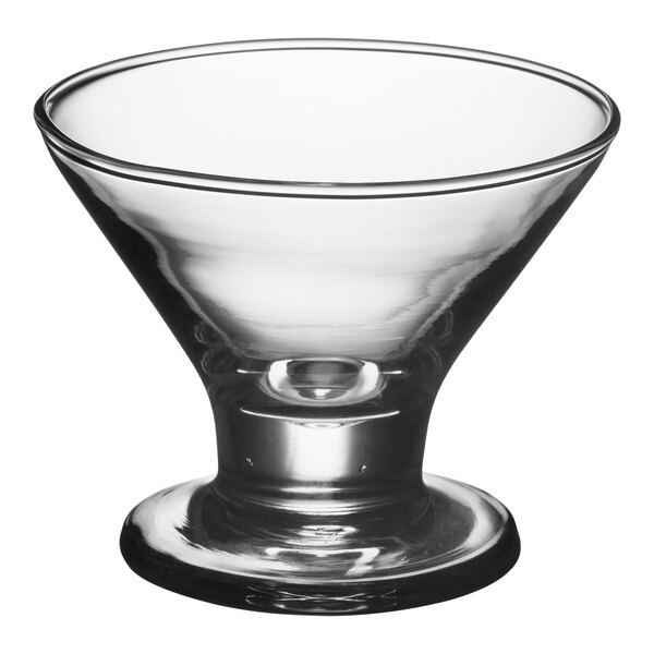 A clear, footed glass designed for serving martinis or desserts, with a 7 oz. capacity.