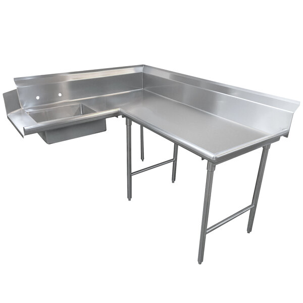 A stainless steel L-shaped dishtable with a counter and a drain.