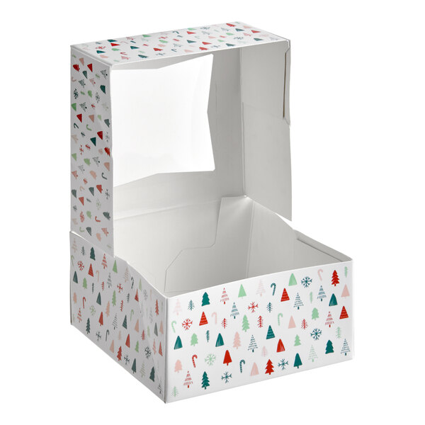 A white bakery box with a clear window and a modern Christmas tree print design.
