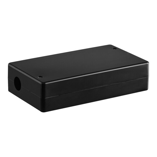 A rectangular black plastic enclosure with a smooth surface, two visible screw holes on the top, and a circular opening on one side.