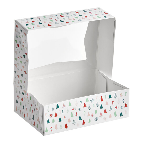 A rectangular bakery box with a clear window and a modern Christmas print featuring trees, snowflakes, and candy canes.