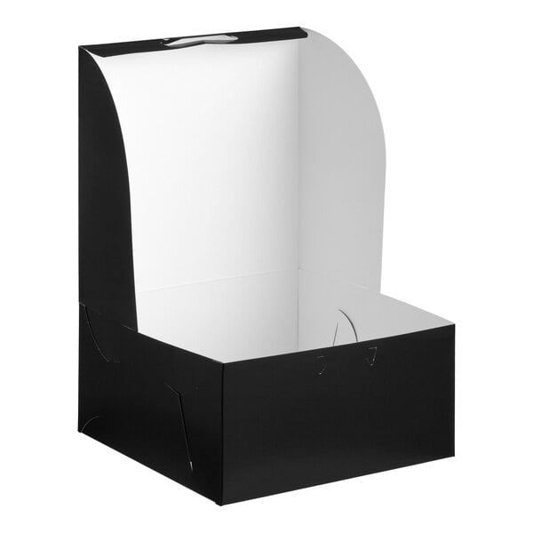 A black and white cardboard bakery box with an open lid, designed for cakes or baked goods.