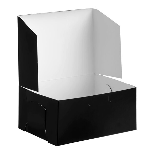 A black bakery box with an open lid and white interior, measuring 6 by 4.5 by 2.75 inches.